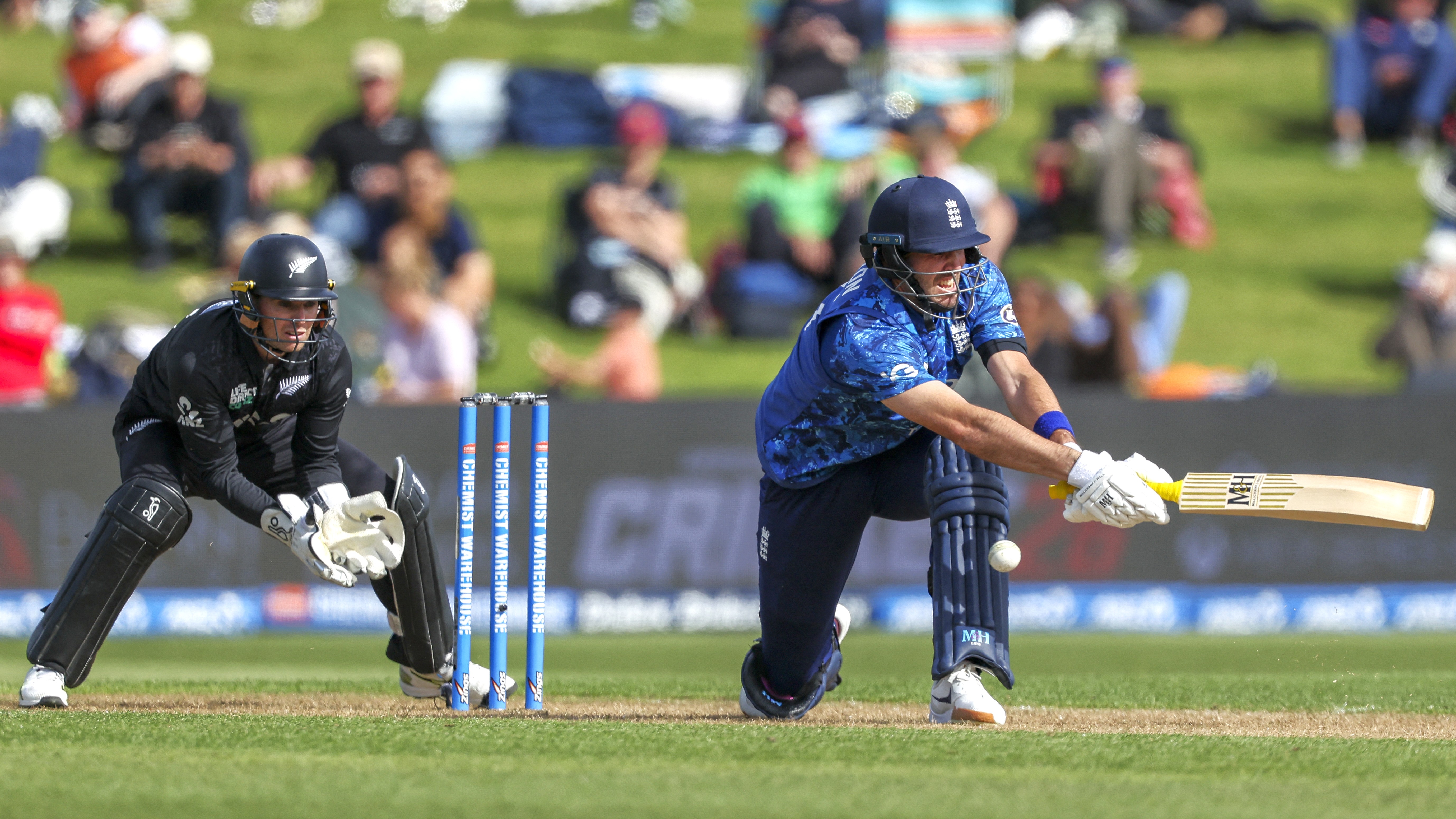 England's Jamie Overton sweeps during the second one-day international between New Zealand and England at Seddon Park in Hamilton on October 29, 2025