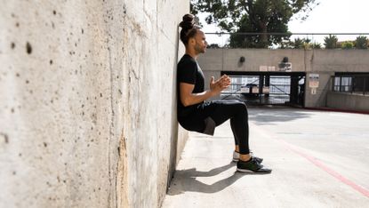 How to Do a Perfect Wall Sit and Boost It - Anytime Fitness