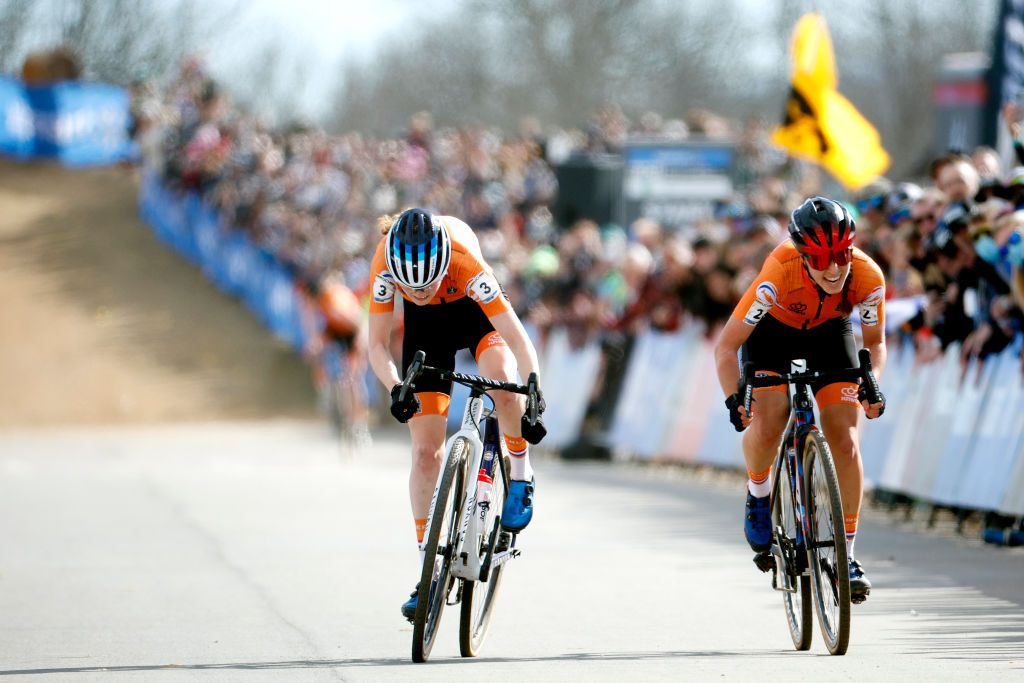 FAYETTEVILLE ARKANSAS JANUARY 30 LR Puck Pieterse of Netherlands and Shirin Van Anrooij of Netherlands sprint to win during the 73rd UCI CycloCross World Championships Fayetteville 2022 Womens U23 Fayetteville2022 on January 30 2022 in Fayetteville Arkansas Photo by Chris GraythenGetty Images