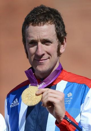 Bradley Wiggins on the podium with the gold medal that saw him become Great Britain's most successful Olympian