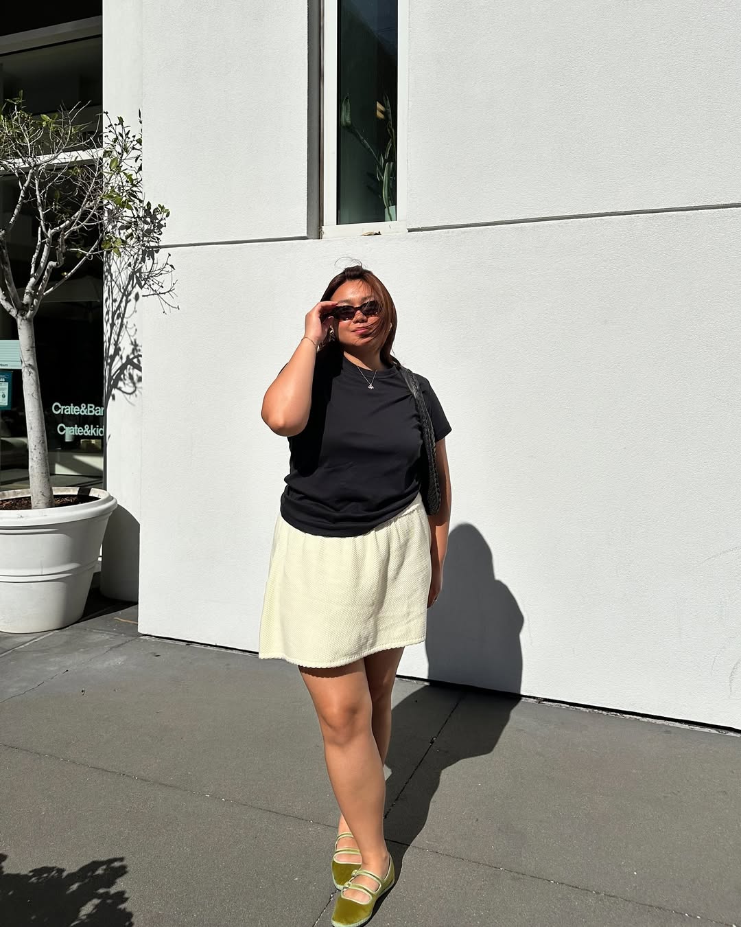 Marina in a yellow mini skirt