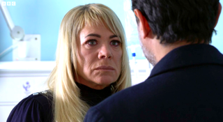 Sharon looks scared as Nish threatens her