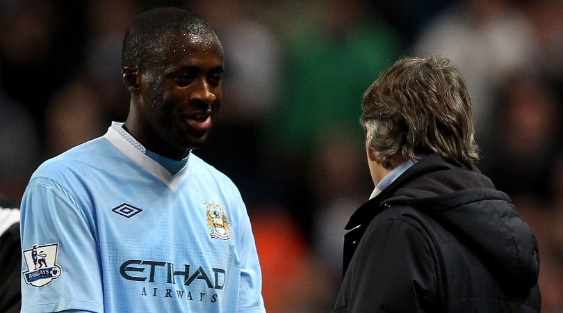 Yaya Toure and Roberto Mancini at Manchester City in 2012.