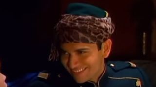 Esteban smiling as he's possessed in The Suite Life of Zack and Cody.