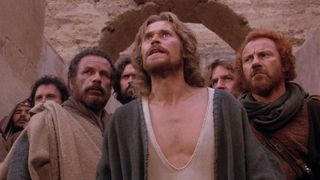 Willem Dafoe as Jesus, flanked by disciples in The Last Temptation of Christ.