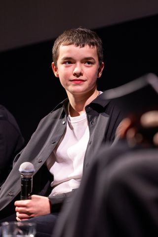 Owen Cooper speaks onstage during a Q&A at a special screening of Netflix's "Adolescence" at BAFTA Piccadilly on March 12, 2025 in London, England.