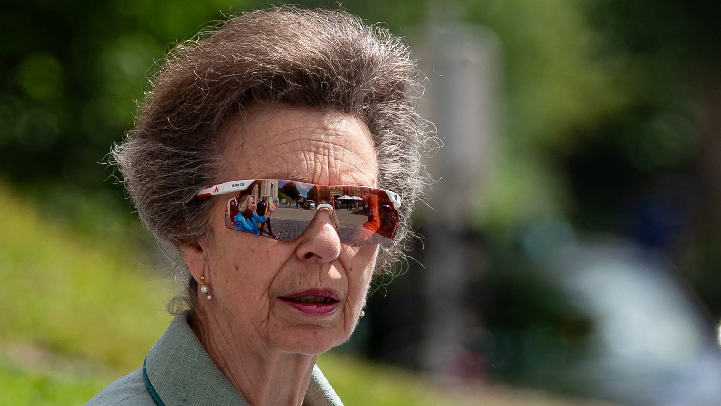Princess Anne, wearing sunglasses, attends the reopening ceremony of the restored Menin Gate