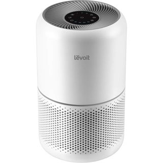 A white cylindrical air purifier