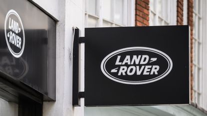 A Land Rover sign, taken after the company announced they were cutting 4,000 jobs