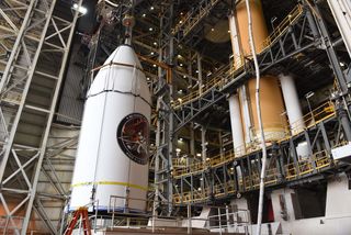The classified NROL-47 spy satellite, encapsulated in its protective payload fairing, is seen before being attached to its Delta IV rocket for a launch from Vandenberg Air Force Base in California.