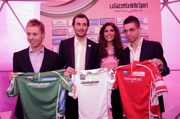 Damiano Cunego, Ivan Basso, Yolanthe Cabau Van Kasbergen and Giovanni Visconti with the mountain leader's, best young rider's and points leader's jerseys.
