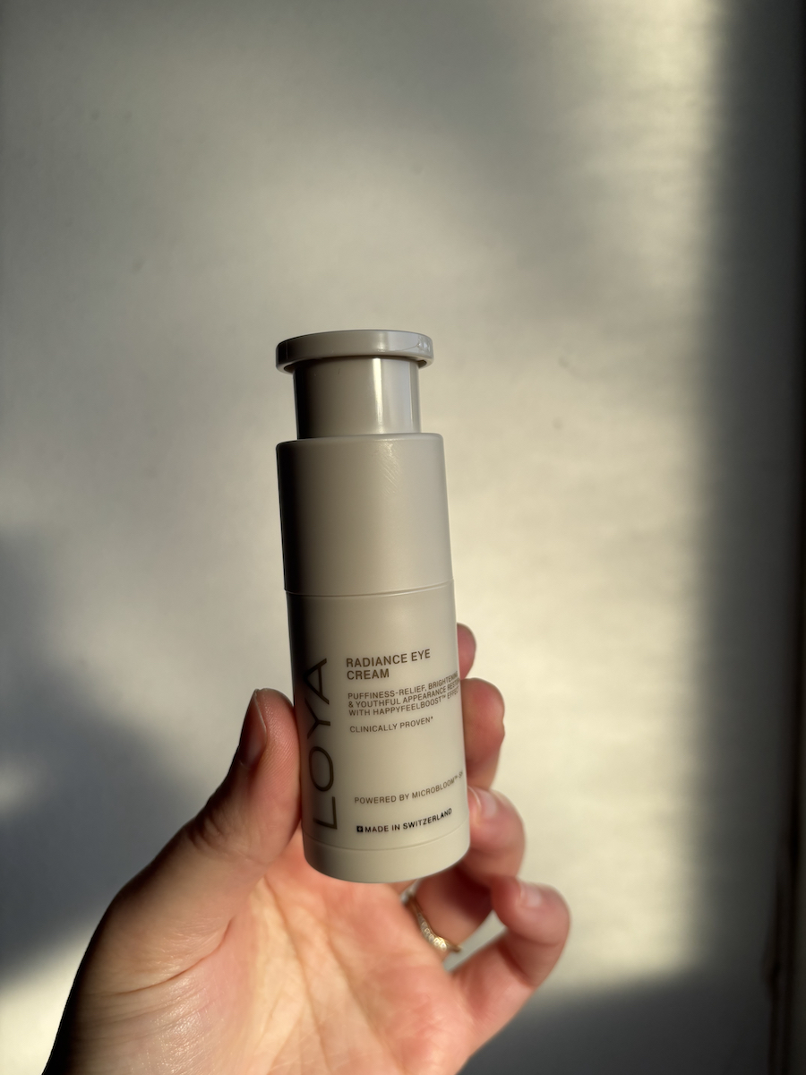 Mica Ricketts holding Loya Radiance Eye Cream