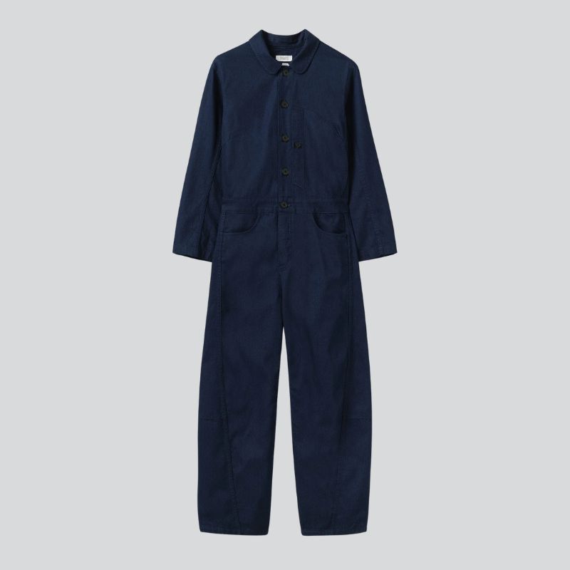A cutout shot of a navy blue jumpsuit by Toast