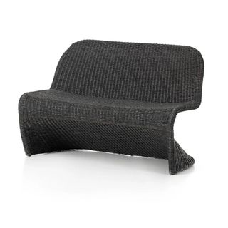 A black curved bench