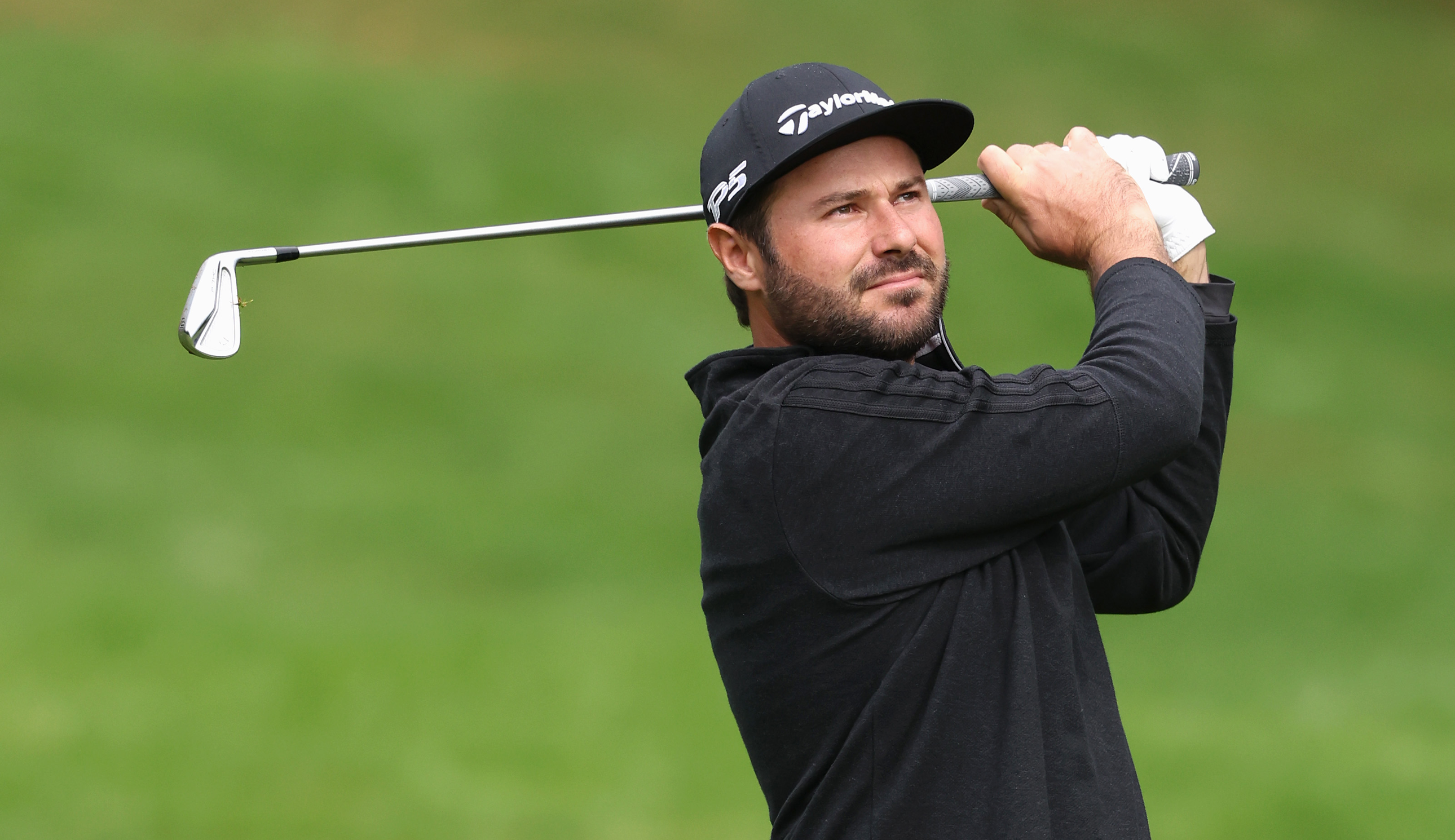Victor Dubuisson hits an iron shot