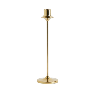 A gold candlestick holder