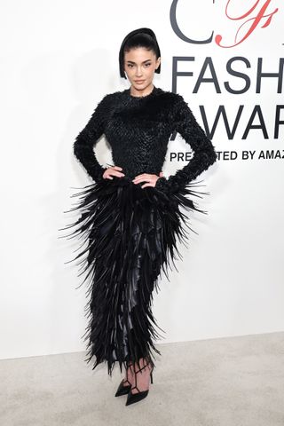 Kylie Jenner arrives on the red carpet at the 2024 CFDA Awards