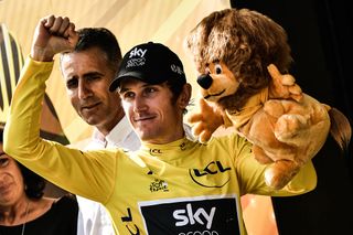 Geraint Thomas (Team Sky) waves to the crowd after securing the yellow jersey at the Tour de France