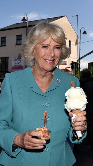 Queen Camilla holding two ice creams