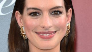 Anne Hathaway wearing eye makeup looks brown eyes