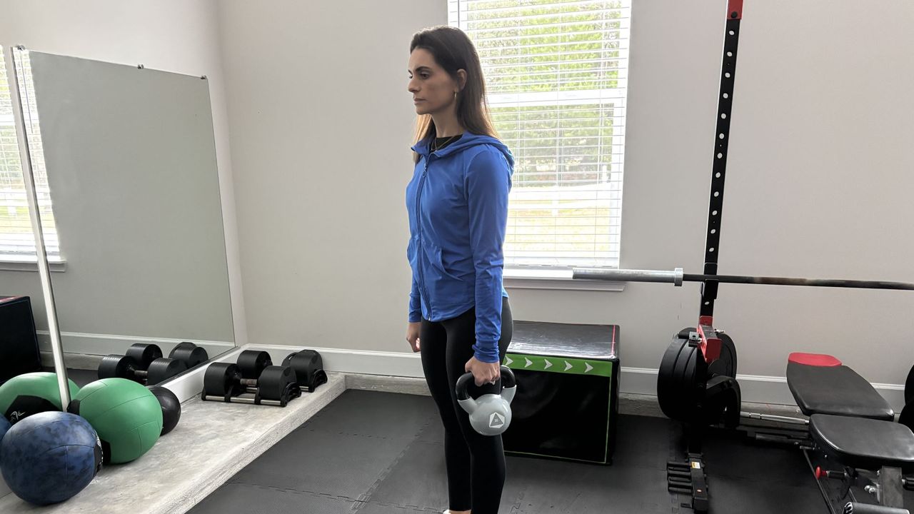 Tami Smith demonstrates a lateral lunge