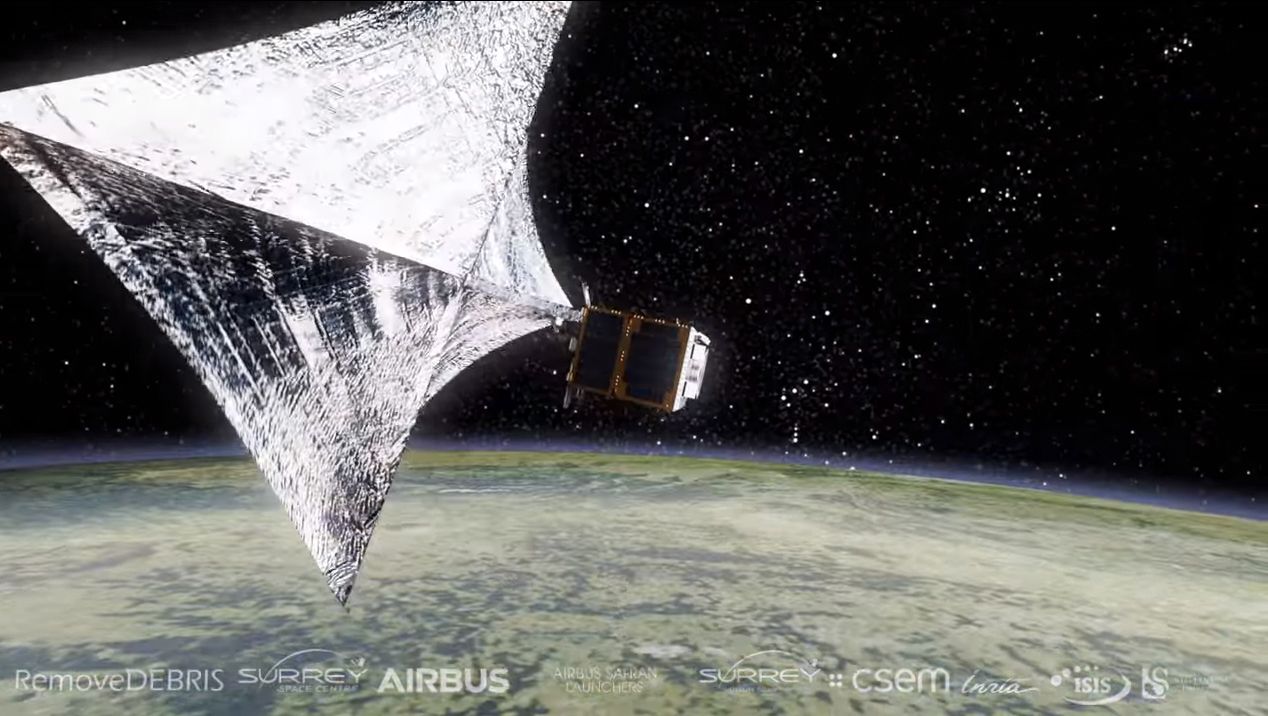 This Space Junk Removal Experiment Will Harpoon & Net Debris in Orbit ...