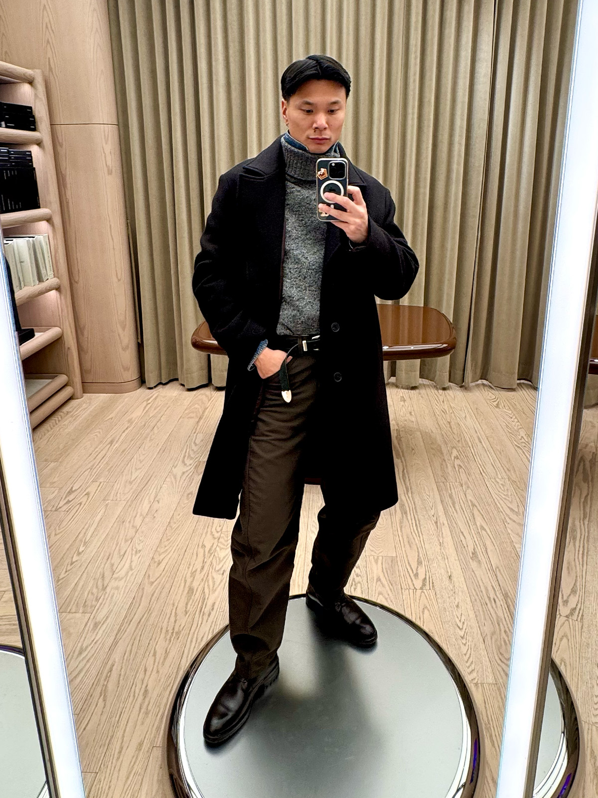 Who What Wear editor in residence Joseph Tang wearing a wool coat.