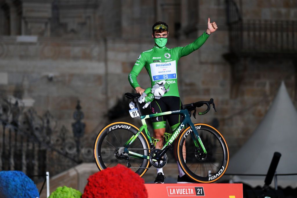 SANTIAGO DE COMPOSTELA SPAIN SEPTEMBER 05 Fabio Jakobsen of Netherlands and Team Deceuninck QuickStep celebrates winning the green points jersey on the podium ceremony after the 76th Tour of Spain 2021 Stage 21 a 338 km Individual Time Trial stage from Padrn to Santiago de Compostela lavuelta LaVuelta21 ITT on September 05 2021 in Santiago de Compostela Spain Photo by Tim de WaeleGetty Images
