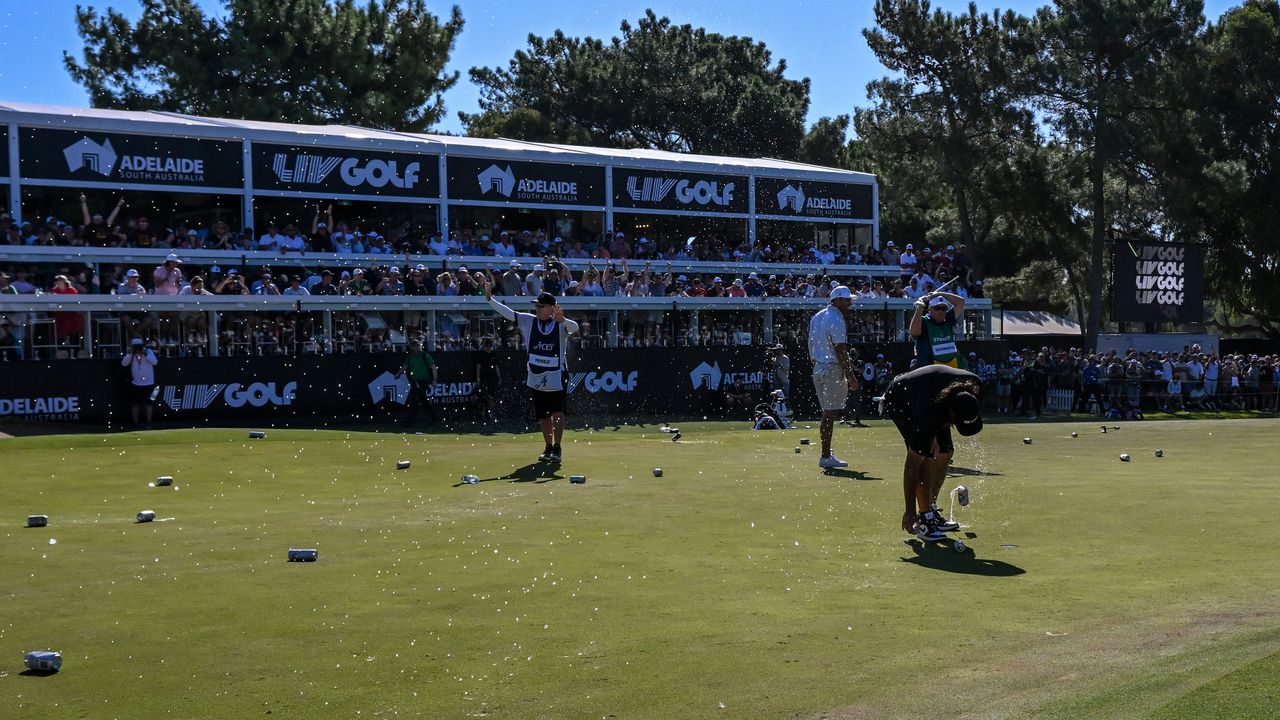 Beer cans seen on the green at the LIV Golf Australia event