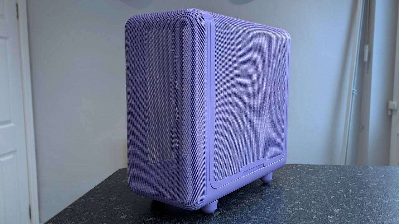 HYTE X50 Taro Milk PC case on a marble desk top, highlighting key features