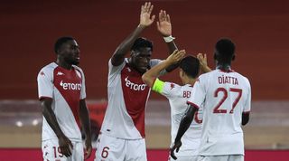 Monaco's French defender Axel Disasi (C) celebrates after scoring a goal during the UEFA Champions League third qualifying round first leg football match between AS Monaco and PSV Eindhoven at the Stade Louis II in Monaco on August 2, 2022.