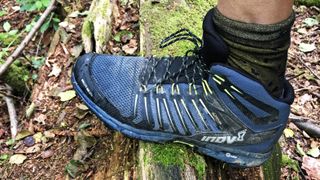 Person's foot wearing inov-8 ROCLITE 345 GTX hiking boot