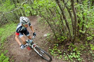 Sam Schultz (Subaru Trek) climbins on the Missoula XC course