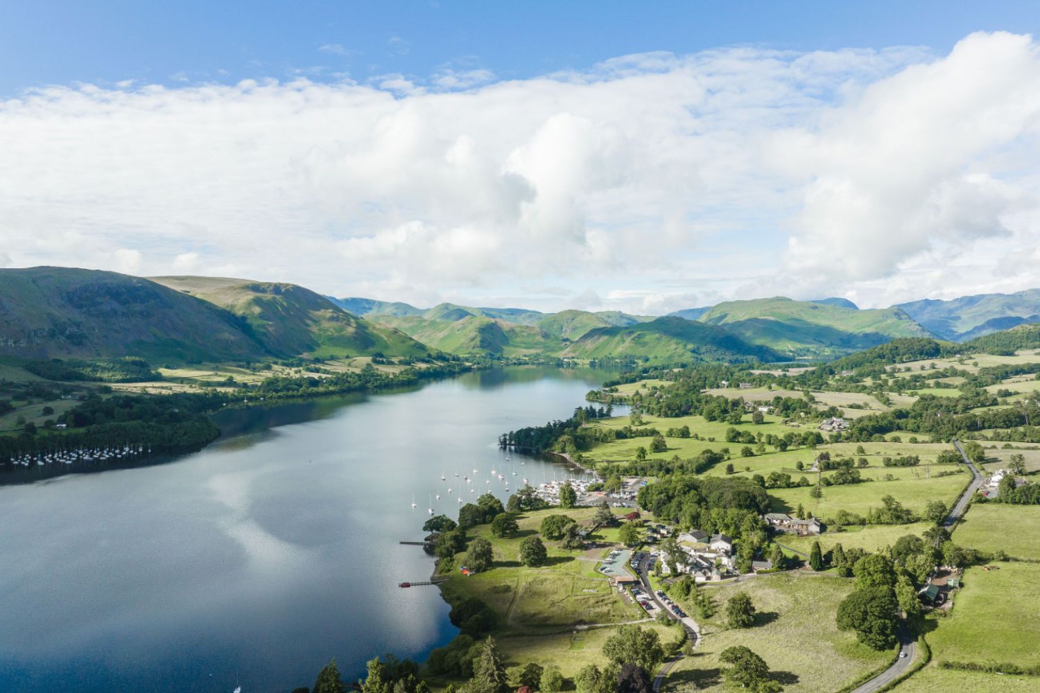 image of lake and green surrounding areas near Another Place