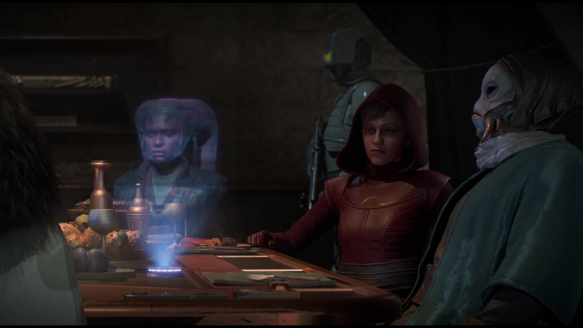 Two representatives from the Star Wars Outlaws sit at a dinner table