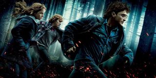 Harry Potter and the Deathly Hallows Hermione, Ron, and Harry run through the woods