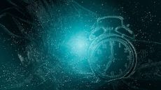 Abstract image of an alarm clock against a black space-like background.