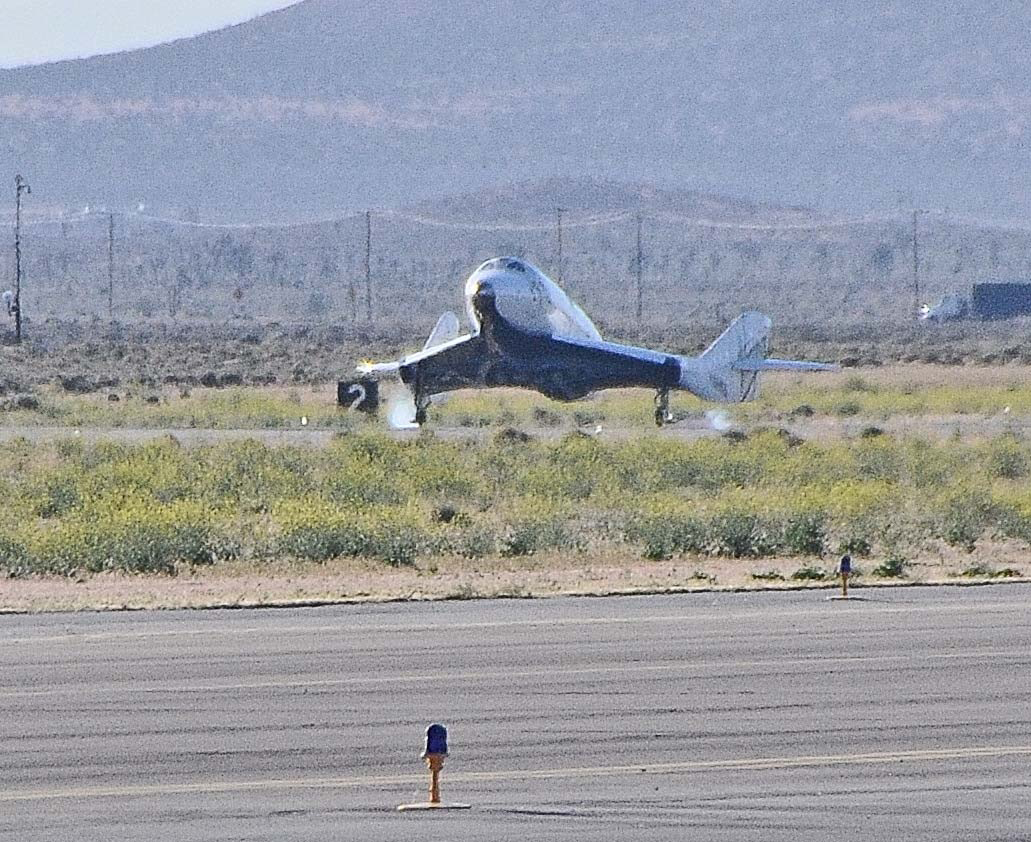 After its fifth glide test flight – the longest one yet – Virgin Galactic&#039;s first SpaceShipTwo passenger spaceship touches down on a runway at the Mojave Air and Space Port in California on April 22, 2011.