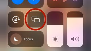 The screen mirroring icon in control center on iPhone