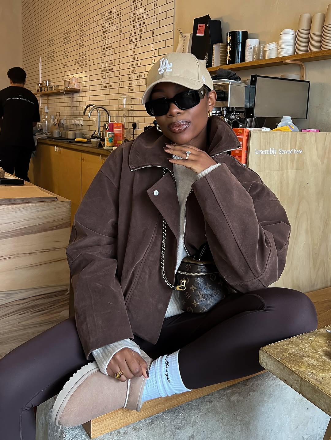 woman wearing winter legging outfit 2025