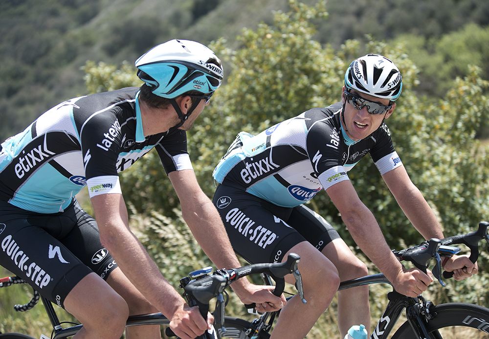 Etixx-Quick Step riders chat in the bunch