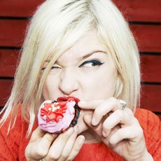 Woman Eating Cupcake