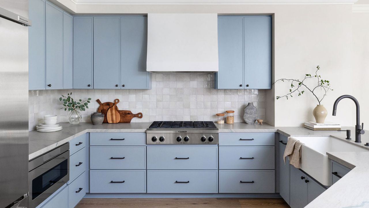 kitchen with light blue painted cabinets