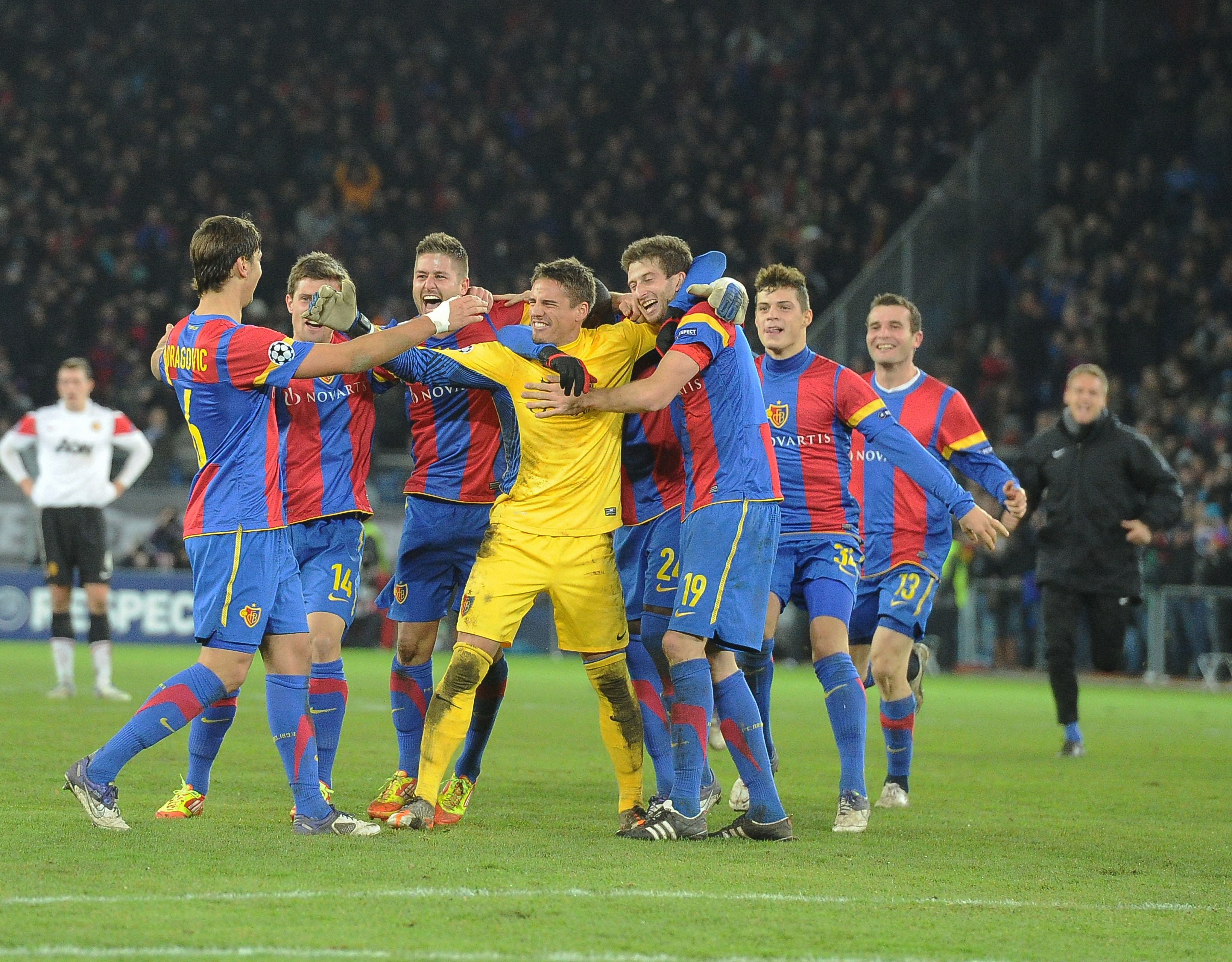 Basel players celebrate victory over Manchester United in the 2011/12 Champions League group stage