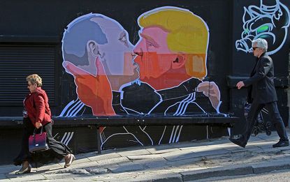 A mural of Donald Trump and Vladimir Putin kissing