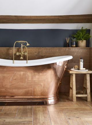 copper bath with white ceramic inside
