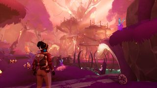 Creatures of Ava - a human player looks up at a raised treehouse villages in a bright purple world