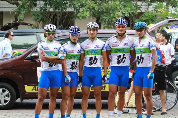The Action Cycling Team pose for a photo.