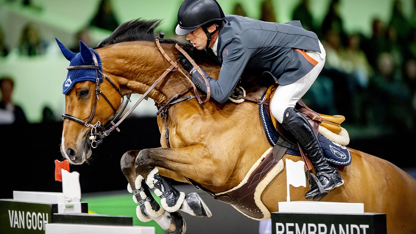 Harrie Smolders and Monaco in action during the Rolex grand prix at Den Bosch.