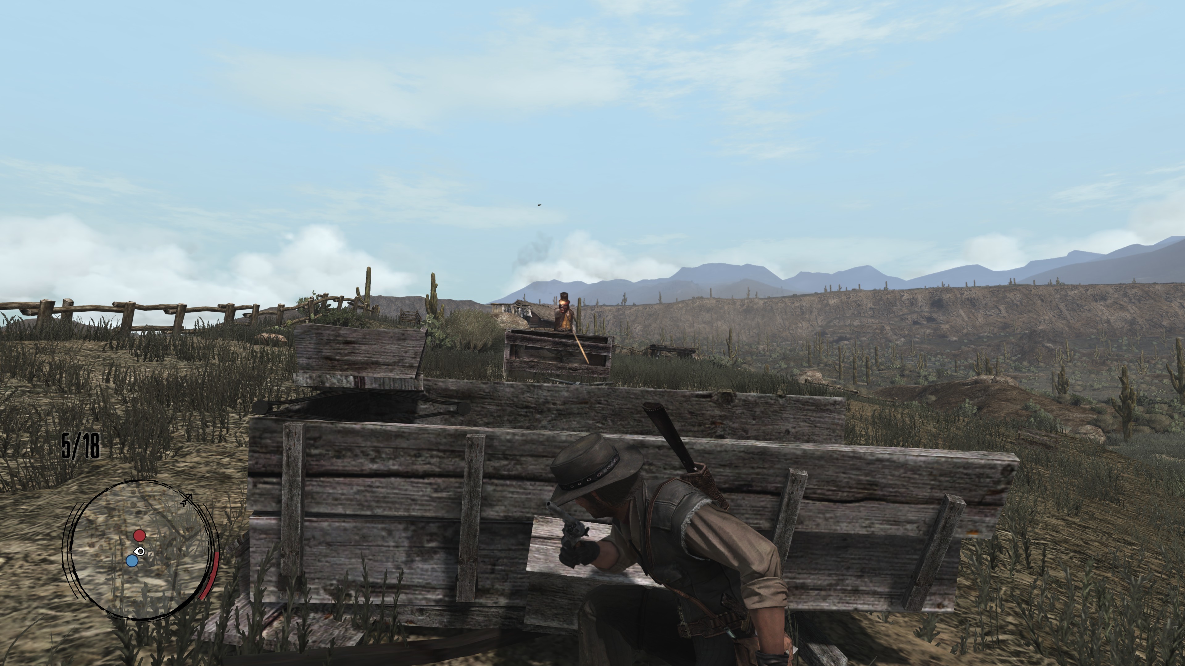 John Marston takes cover in a gunfight.